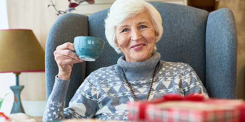 happy-senior-lady-drinking-coffee