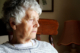 A senior woman feels anxious due to boredom’s effect on dementia.